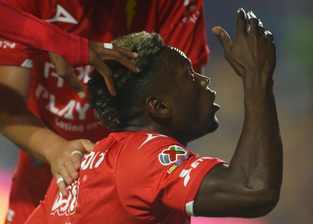 Necaxa's Colombian forward #27 Diber Cambindo celebrates after scoring the opening goal during the Liga MX Apertura tournament football match between Tigres and Necaxa at the University stadium -aka El Volcan- in San Nicolas de los Garza, Nuevo Leon, Mexico on October 17, 2025. (Photo by Julio Cesar AGUILAR / AFP)