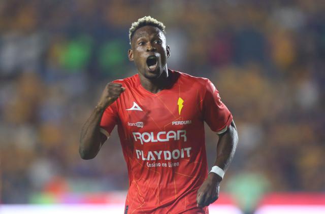 Necaxa's Colombian forward #27 Diber Cambindo celebrates after scoring his second goal during the Liga MX Apertura tournament football match between Tigres and Necaxa at the University stadium -aka El Volcan- in San Nicolas de los Garza, Nuevo Leon, Mexico on October 17, 2025. (Photo by Julio Cesar AGUILAR / AFP)