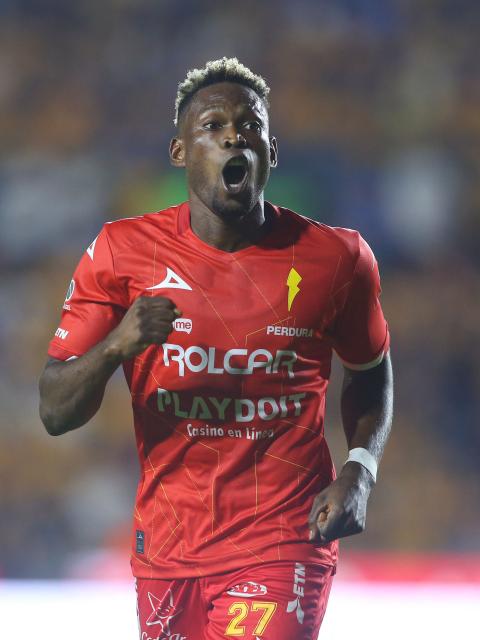 Necaxa's Colombian forward #27 Diber Cambindo celebrates after scoring his second goal during the Liga MX Apertura tournament football match between Tigres and Necaxa at the University stadium -aka El Volcan- in San Nicolas de los Garza, Nuevo Leon, Mexico on October 17, 2025. (Photo by Julio Cesar AGUILAR / AFP)
