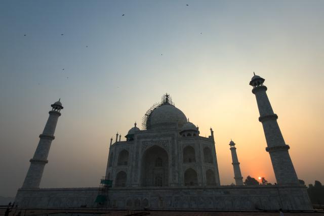 A general view of the Taj Mahal is pictured during sunrise in Agra on October 18, 2025. (Photo by Punit PARANJPE / AFP)