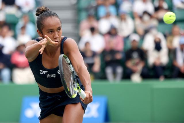 Canada's Leylah Fernandez hits a return to Romania's Sorana Cirstea during their women's singles semi-final match at the Japan Open tennis tournament in Osaka on October 18, 2025. (Photo by PAUL MILLER / AFP)