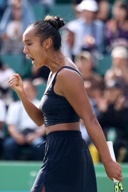 Canada's Leylah Fernandez reacts to winning a point against Romania's Sorana Cirstea during their women's singles semi-final match at the Japan Open tennis tournament in Osaka on October 18, 2025. (Photo by PAUL MILLER / AFP)