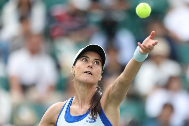 Romania's Sorana Cirstea serves to Canada's Leylah Fernandez during their women's singles semi-final match at the Japan Open tennis tournament in Osaka on October 18, 2025. (Photo by PAUL MILLER / AFP)