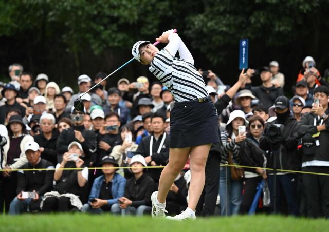 Rio Takeda of Japan tees off on the 2nd hole during the third round of the LPGA Tour - BMW Ladies Championship golf tournament at Pine Beach Golf Links in Haenam on October 18, 2025. (Photo by Jung Yeon-je / AFP)