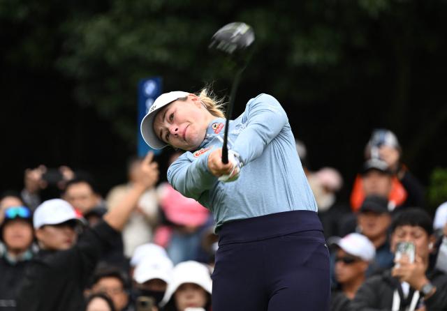 Brooke Matthews of the United States tees off on the 2nd hole during the third round of the LPGA Tour - BMW Ladies Championship golf tournament at Pine Beach Golf Links in Haenam on October 18, 2025. (Photo by Jung Yeon-je / AFP)