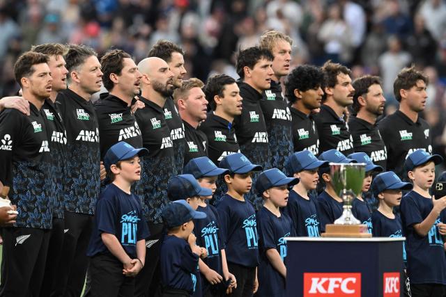 New Zealand's players line up for the national anthem during the first Twenty20 international cricket match between New Zealand and England at Hagley Oval in Christchurch on October 18, 2025. (Photo by Sanka VIDANAGAMA / AFP)