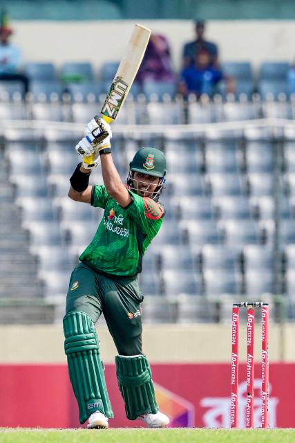 Bangladesh's Soumya Sarkar plays a shot during the first one-day international (ODI) cricket match between Bangladesh and West Indies at the Sher-e-Bangla National Cricket Stadium in Dhaka on October 18, 2025. (Photo by Munir UZ ZAMAN / AFP)