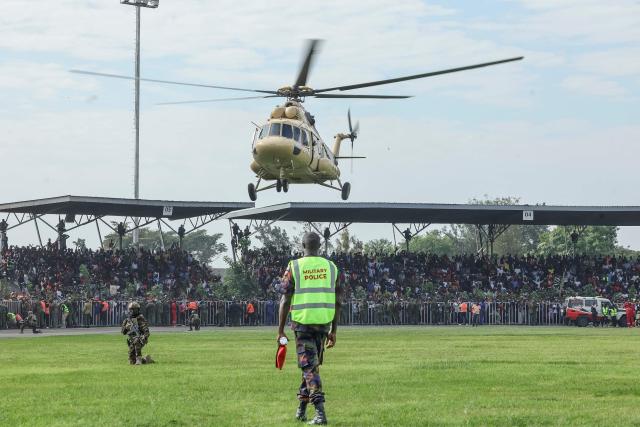The military helicopter bearing the remains of Kenya’s opposition leader and former Prime Minister Raila Odinga arrives at the Jomo Kenyatta Stadium in Kisumu on October 18, 2025. Vast crowds gathered in western Kenya on October 18, 2025 to see the body of a beloved politician, Raila Odinga, for the biggest day of mourning ceremonies. (Photo by Tony KARUMBA / AFP)
