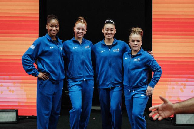 USA's gymnasts pose after training at the Indonesia Arena in Jakarta on October 18, 2025, ahead of the 53rd FIG Artistic Gymnastics World Championships. The Championships will be held from October 19 to 25 for the first time in a Southeast Asian country. (Photo by Yasuyoshi CHIBA / AFP)
