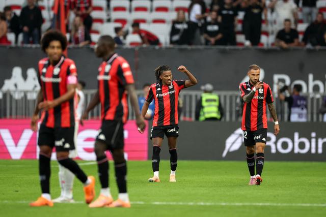 Nice's Algerian midfielder #06 Hicham Boudaoui (C) celebrates scoring his team's third goal during the French L1 football match between OGC Nice and Olympique Lyonnais at the Allianz Riviera Stadium in Nice, south-eastern France on October 18, 2025. (Photo by Valery HACHE / AFP)