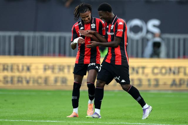 Nice's Algerian midfielder #06 Hicham Boudaoui (L) celebrates scoring his team's third goal during the French L1 football match between OGC Nice and Olympique Lyonnais at the Allianz Riviera Stadium in Nice, south-eastern France on October 18, 2025. (Photo by Valery HACHE / AFP)