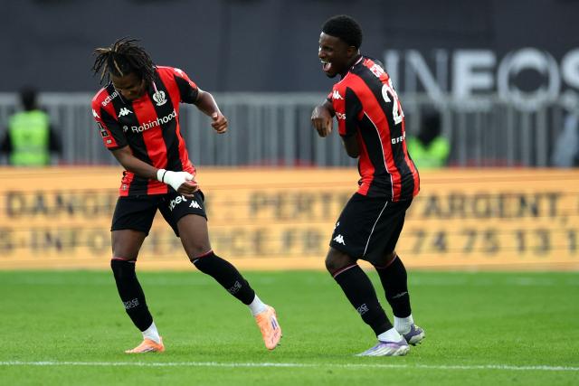 Nice's Algerian midfielder #06 Hicham Boudaoui (L) celebrates scoring his team's third goal during the French L1 football match between OGC Nice and Olympique Lyonnais at the Allianz Riviera Stadium in Nice, south-eastern France on October 18, 2025. (Photo by Valery HACHE / AFP)