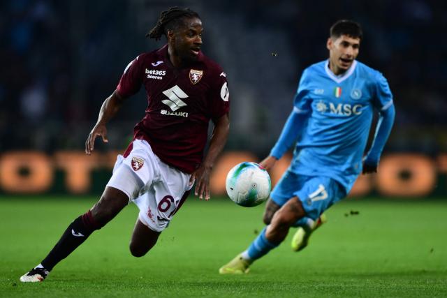 Torino’s French midfielder #61 Adrien Tameze controls the ball during the Italian Serie A football match between Torino and Napoli at The Grande Torino Stadium in Turin on October 18, 2025. (Photo by MARCO BERTORELLO / AFP)