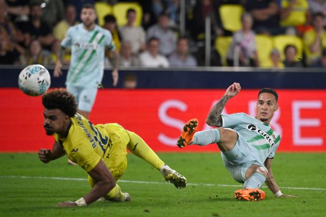 Real Betis' Brazilian forward #07 Antony scores his second goal during the Spanish league football match between Villarreal CF and Real Betis at La Ceramica Stadium in Vila-real on October 18, 2025. (Photo by Jose JORDAN / AFP)