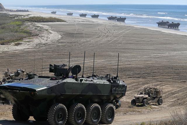 Marines perform an amphibious capabilities demonstration as US Vice President JD Vance and US Second Lady Usha Vance visit, on Red Beach at Camp Pendleton, California, on October 18, 2025 as part of the Marine Corps' 250th anniversary celebrations. (Photo by Oliver Contreras / AFP)