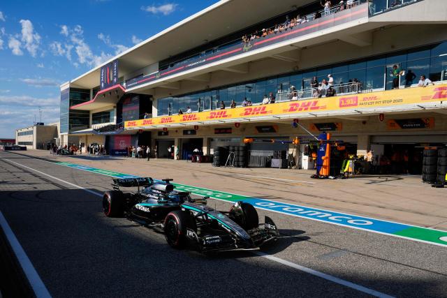 Mercedes' British driver George drives in pit lane during the qualifying session for the United States Formula One Grand Prix at the Circuit of the Americas in Austin, Texas, on October 18, 2025. (Photo by John Locher / POOL / AFP)