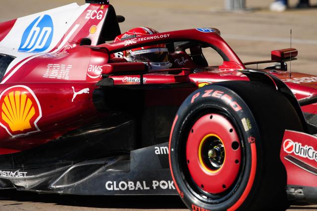 Ferrari's Monegasque driver Charles Leclerc drives in pit lane during the qualifying session for the United States Formula One Grand Prix at the Circuit of the Americas in Austin, Texas, on October 18, 2025. (Photo by John Locher / AFP)