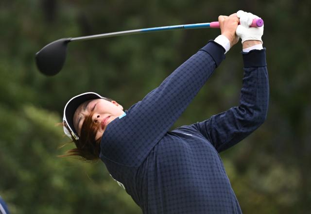Rio Takeda of Japan tees off on the 5th hole during the final round of the LPGA Tour - BMW Ladies Championship golf tournament at Pine Beach Golf Links in Haenam on October 19, 2025. (Photo by Jung Yeon-je / AFP)
