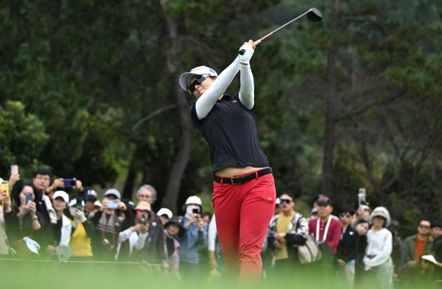 Kim Sei-young of South Korea tees off on the 5th hole during the final round of the LPGA Tour - BMW Ladies Championship golf tournament at Pine Beach Golf Links in Haenam on October 19, 2025. (Photo by Jung Yeon-je / AFP)