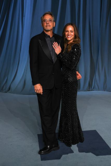 US actor Robert Downey Jr. and Susan Downey attend the Academy Museum Gala at the Academy Museum of Motion Pictures in Los Angeles on October 18, 2025. (Photo by VALERIE MACON / AFP)