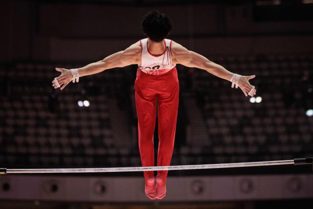 Japan's Daiki Hashimoto performs during the men's qualifying session at the 53rd FIG Artistic Gymnastics World Championships In Jakarta on October 19, 2025. (Photo by Yasuyoshi CHIBA / AFP)