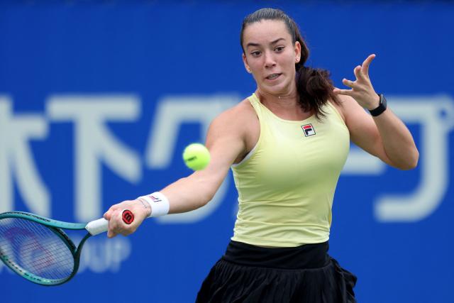 Czech Republic's Tereza Valentova hits a return to Canada's Leylah Fernandez during their women's singles final match at the Japan Open tennis tournament in Osaka on October 19, 2025. (Photo by PAUL MILLER / AFP)