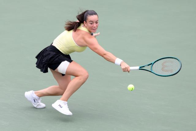 Czech Republic's Tereza Valentova hits a return to Canada's Leylah Fernandez during their women's singles final match at the Japan Open tennis tournament in Osaka on October 19, 2025. (Photo by PAUL MILLER / AFP)