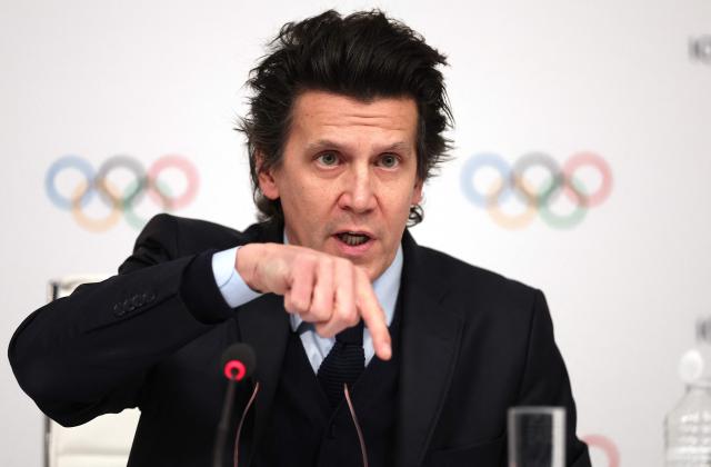 (FILES) Olympic Games Executive Director Christophe Dubi gestures during a press conference after an International Olympic Committee (IOC) Executive Board committee meeting in Paris, on November 29, 2023. Split into seven poles, the 2026 Milan-Cortina Olympics inaugurate a model whose success "is fundamental" for the 2030 edition in the French Alps, Christophe Dubi, executive director of the Games at the International Olympic Committee (IOC), told AFP. (Photo by FRANCK FIFE / AFP)