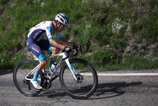 (FILES) Bahrain Victorious's French rider Lenny Martinez cycles in the final kilometers of the 8th and final stage of the 77th edition of the Criterium du Dauphine cycling race, 133,3 km between Val-d'Arc and Val-Cenis - Plateau du Mont Cenis, on June 15, 2025. French climber Lenny Martinez ended the season in style by winning the Japan Cup solo on October 19, 2025 in Utsunomiya. The 22-year-old Cannes rider has won three World Tour races this year, winning a stage at Paris-Nice, the Tour de Romandie and the Critérium du Dauphiné. (Photo by Anne-Christine POUJOULAT / AFP)