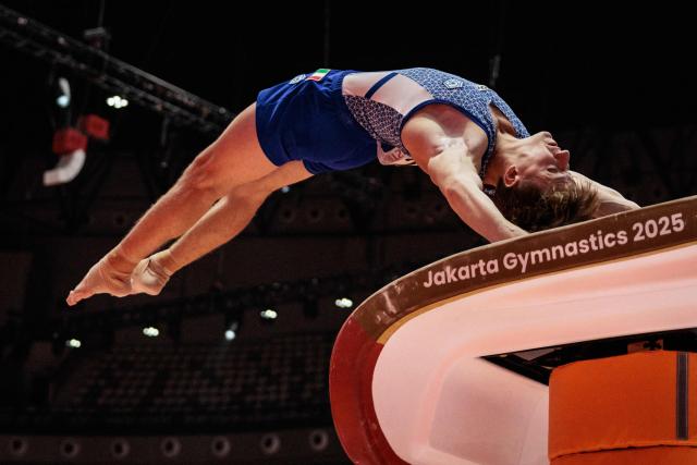 Italy’s Tommaso Brugnami competes on the vault during the men's qualifying session at the 53rd FIG Artistic Gymnastics World Championships In Jakarta on October 19, 2025. (Photo by Yasuyoshi CHIBA / AFP)