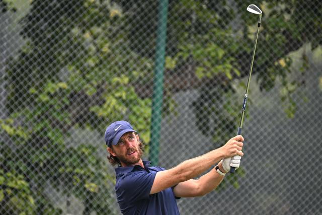 England's Tommy Fleetwood hits a shot during the final day of the DP World India Championship 2025 golf tournament at the Delhi Golf Club in New Delhi on October 19, 2025. (Photo by Sajjad HUSSAIN / AFP)