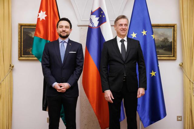 Slovenian Prime Minister Robert Golob (R) and Jordan's Crown Prince Hussein pose during their meeting in Brdo pri Kranju, on October 19, 2025. (Photo by Luka Dakskobler / AFP)