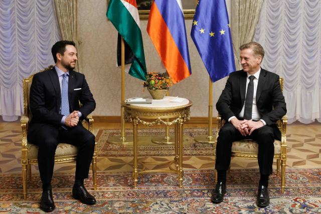 Slovenian Prime Minister Robert Golob (R) and Jordan's Crown Prince Hussein talk during their meeting in Brdo pri Kranju, on October 19, 2025. (Photo by Luka DAKSKOBLER / AFP)