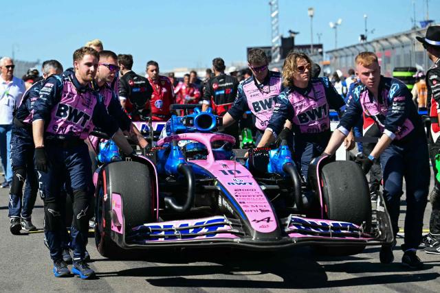 Alpine's French driver Pierre Gasly heads to the starting grid before the start of the United States Formula One Grand Prix at the Circuit of the Americas in Austin, Texas, on October 19, 2025. (Photo by Jim WATSON / AFP)