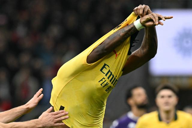 AC Milan's Portuguese forward #10 Rafael Leao celebrates after scoring his team's second goal during the Italian Serie A football match between AC Milan and Fiorentina at San Siro stadium in Milan, northern Italy, on October 19, 2025. (Photo by Stefano RELLANDINI / AFP)