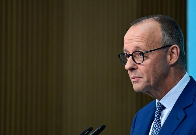 German Chancellor Friedrich Merz addresses journalists on October 20, 2025 at his conservative Christian Democratic Union's (CDU) party headquarters in Berlin, Germany. Merz issued a challenge to Germany's far-right Alternative for Germany (AfD) party, after the CDU's executive committee had been discussing how to deal with the far-right AfD party to stop its rise. (Photo by John MACDOUGALL / AFP)
