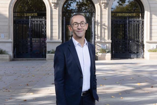 Mayor of Paris' 11th arrondissement Francois Vauglin, of the French Socialist Party (PS), poses for a portrait during a photo session outside the 11th arrondissement district hall in Paris, on October 14, 2025. (Photo by Geoffroy VAN DER HASSELT / AFP)
