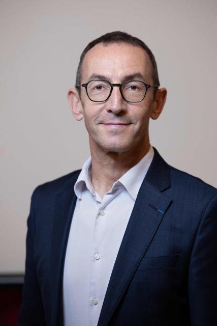 Mayor of Paris' 11th arrondissement Francois Vauglin, of the French Socialist Party (PS), poses for a portrait during a photo session in the 11th arrondissement district hall in Paris, on October 14, 2025. (Photo by Geoffroy VAN DER HASSELT / AFP)