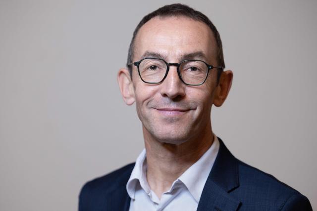 Mayor of Paris' 11th arrondissement Francois Vauglin, of the French Socialist Party (PS), poses for a portrait during a photo session in the 11th arrondissement district hall in Paris, on October 14, 2025. (Photo by Geoffroy VAN DER HASSELT / AFP)