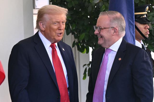 US President Donald Trump greets Australia's Prime Minister Anthony Albanese at the White House in Washington, DC, on October 20, 2025. (Photo by SAUL LOEB / AFP)