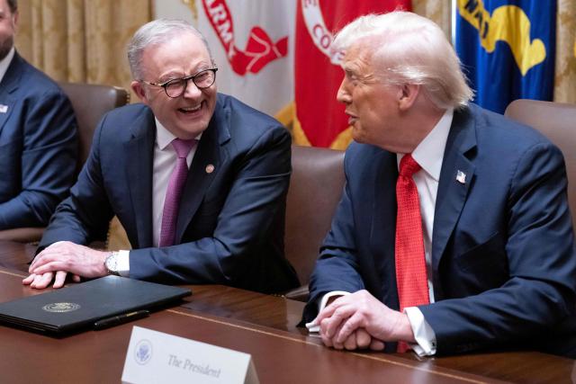 US President Donald Trump (R) speaks with Australia's Prime Minister Anthony Albanese in the Cabinet Room at the White House in Washington, DC, on October 20, 2025. (Photo by SAUL LOEB / AFP)