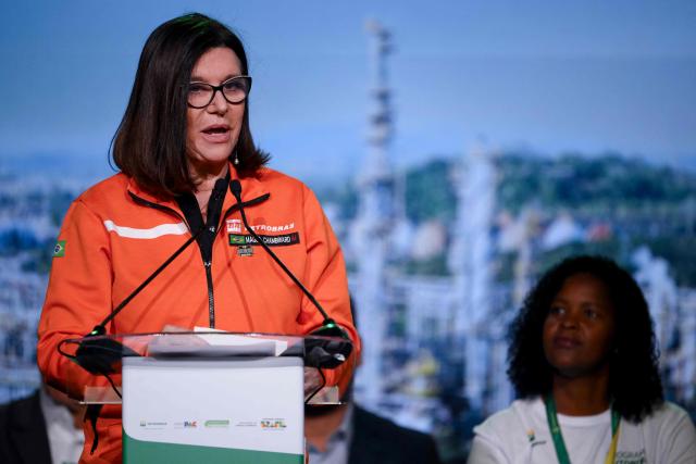 (FILES) Petrobras president Magda Chambriard speaks speaks during an event to announce investments in oil and gas industry, at Duque de Caxias refinery (REDUC) of Brazilian energy company Petrobras, in Duque de Caxias, Rio de Janeiro state, Brazil, on July 4, 2025. Just days before the COP30 climate summit in Brazil, Petrobras announced on October 20, 2025, that it had received authorization from environmental agency Ibama to begin oil drilling 500 km from the mouth of the Amazon River—a move that has sparked tensions between President Lula’s government and environmentalists. (Photo by Mauro PIMENTEL / AFP)