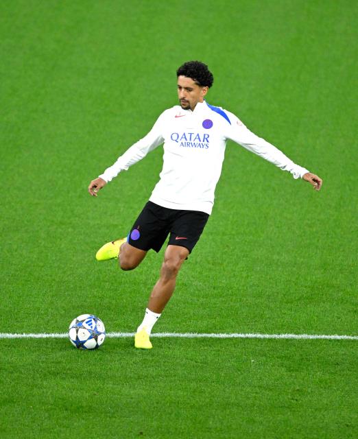 Paris Saint-Germain's Brazilian defender #05 Marquinhos takes part in a training session on the eve of the UEFA Champions League league phase football match between Bayer 04 Leverkusen and Paris Saint-Germain (PSG) at the BayArena stadium in Leverkusen, western Germany on October 20, 2025. (Photo by Ina FASSBENDER / AFP)