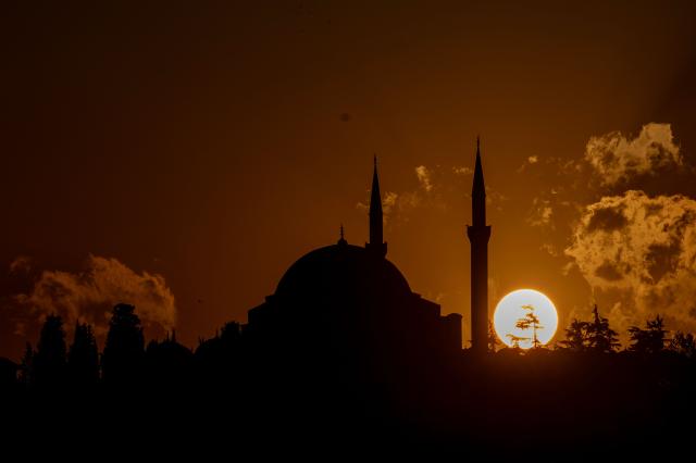 This photograph shows Selimiye mosque during the sunset in Istanbul on October 20,2025. (Photo by Ozan KOSE / AFP)
