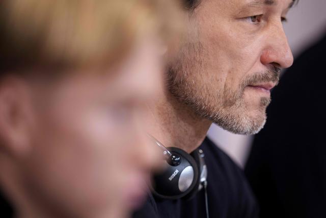 Dortmund's Croatian head coach Niko Kovac (R) and Svensson Dortmund's Swedish defender #24 Daniel Svensson address a press conference on the eve of the UEFA Champions League football match between FC Copenhagen and BVB Borussia Dortmund in Copenhagen on October 20, 2025. (Photo by Liselotte Sabroe / Ritzau Scanpix / AFP) / Denmark OUT