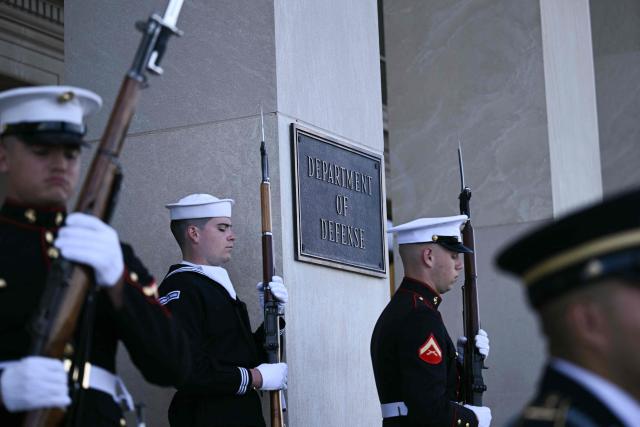 Honor guards stand outside the Department of Defense before US Defense Secretary Pete Hegseth greets New Zealand Defense Minister Judith Collins at the Pentagon in Washington, DC, on October 20, 2025. (Photo by Brendan SMIALOWSKI / AFP)