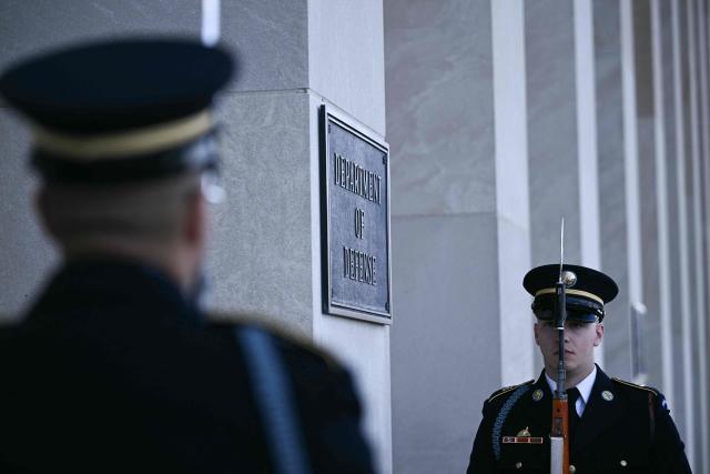 Honor guards stand outside the Department of Defense before US Defense Secretary Pete Hegseth greets New Zealand Defense Minister Judith Collins at the Pentagon in Washington, DC, on October 20, 2025. (Photo by Brendan SMIALOWSKI / AFP)