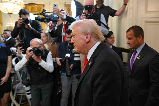 US President Donald Trump arrives to greet the college baseball teams of Louisiana State University (LSU) and LSU Shreveport, winners of this year College World Series and the National Championships, respectively, at the White House in Washington, DC, on October 20, 2025. (Photo by SAUL LOEB / AFP)