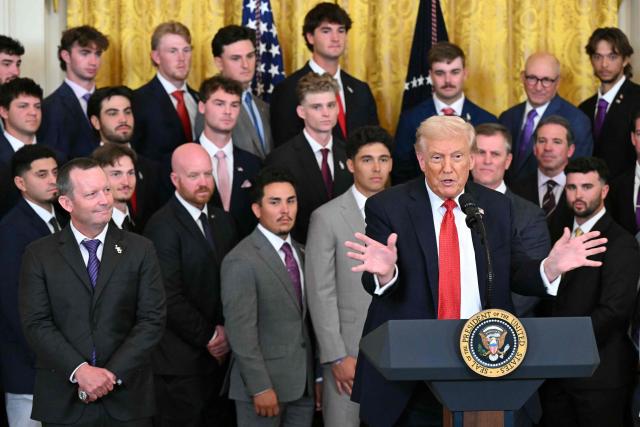 US President Donald Trump speaks alongside the college baseball teams of Louisiana State University (LSU) and LSU Shreveport, winners of this year College World Series and the National Championships, respectively, at the White House in Washington, DC, on October 20, 2025. (Photo by SAUL LOEB / AFP)