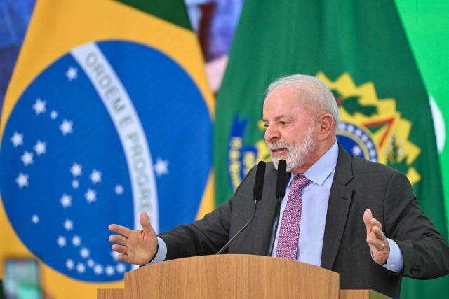 Brazil's President Luiz Inacio Lula da Silva delivers a speech during the launch of a home renovation program for low-income families at Planalto Palace in Brasilia on October 20, 2025. (Photo by Evaristo Sa / AFP)